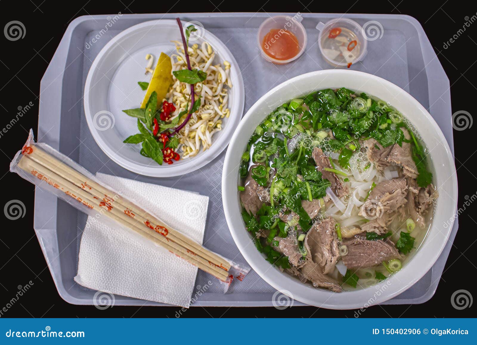 Vietnamese Street Food, Pho Bo Soup with Greens and Rice Flour Noodles