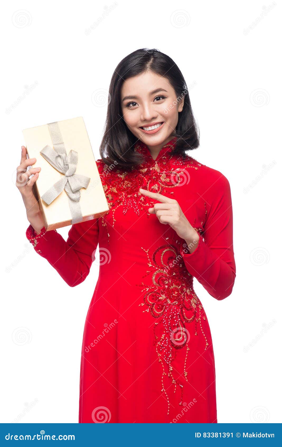 Vietnamese Young Woman in Ao Dai Dress Holdi