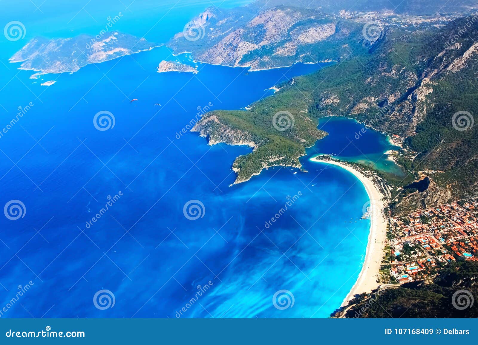 view from above with a paraglider on the bay of the blue lagoon. turkey. oludeniz