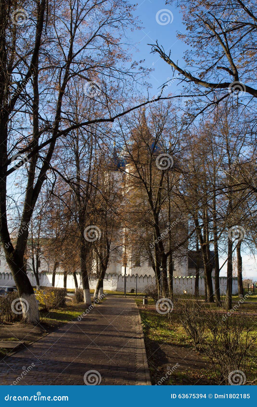 The view of the alleys in the city Park going to the Kremlin photographed early autumn morning. Autumn. Suzdal. Russia. The photo was taken in Suzdal. Autumn. Panorama made from multiple images.