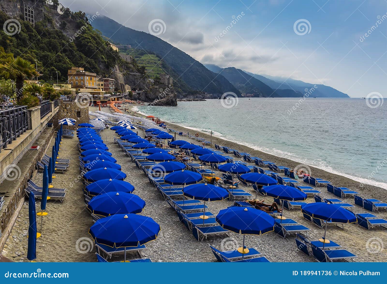 a view along the beach in the early morning at monterosso al mare, italy
