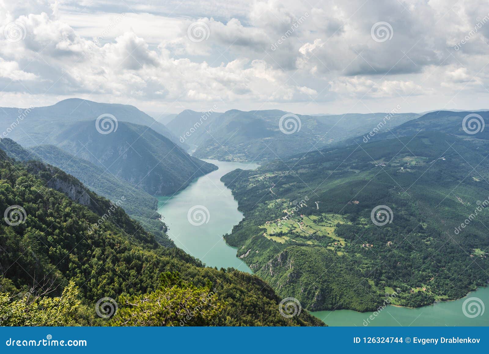 landscape view from banjska stena on drina river, mountains, dam and borde
