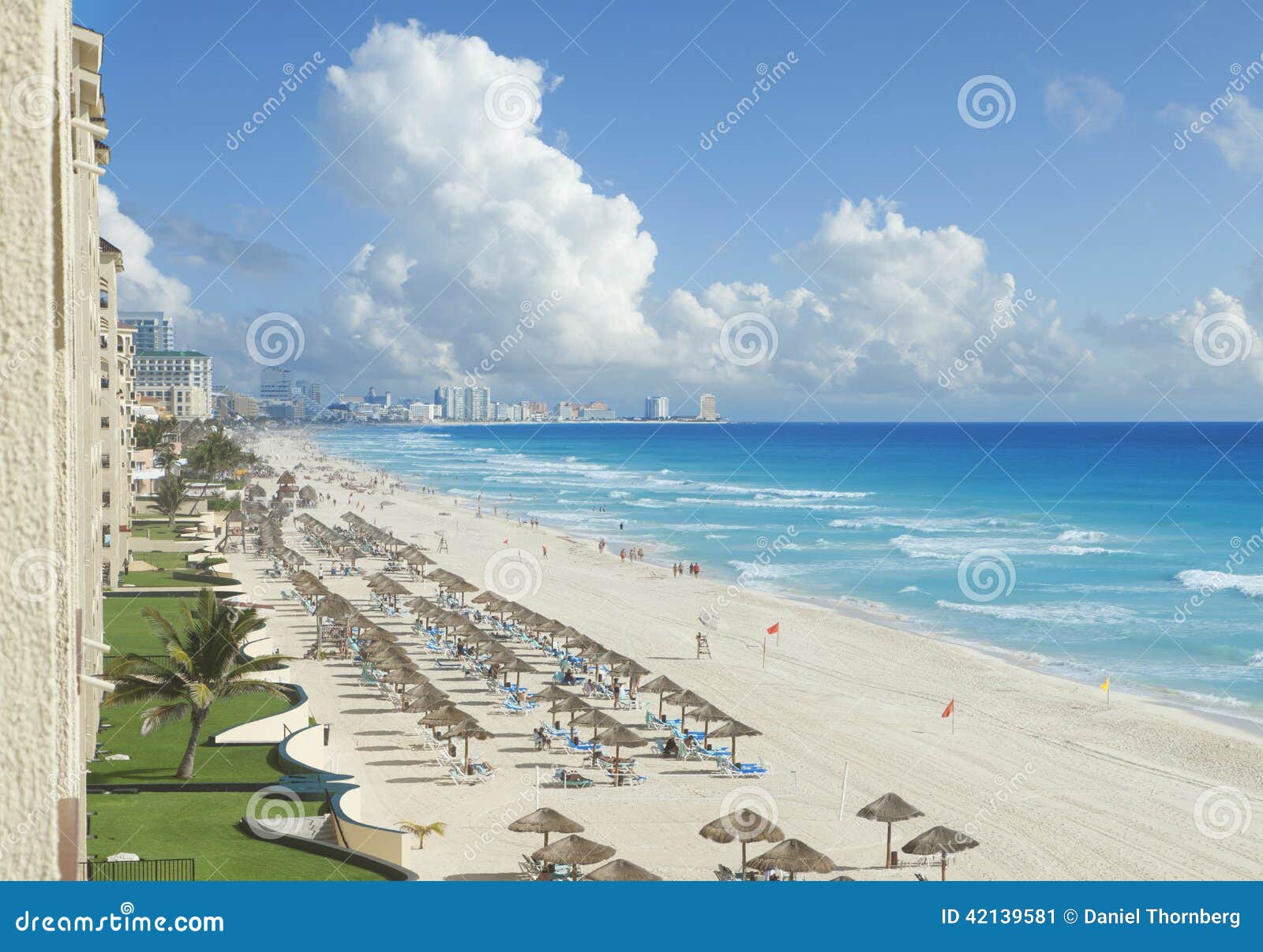 view of beach, caribbean sea and clouds in cancun, mexico