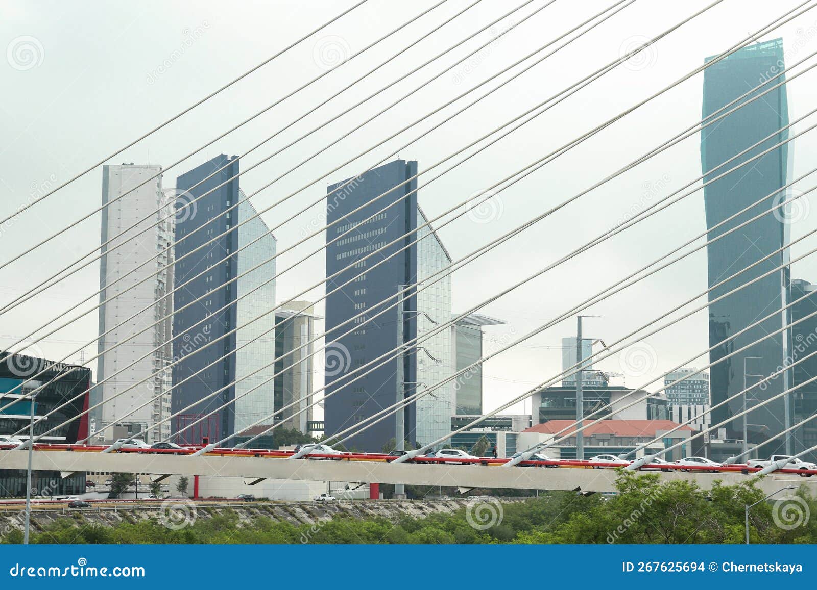 view of beautiful city from modern bridge