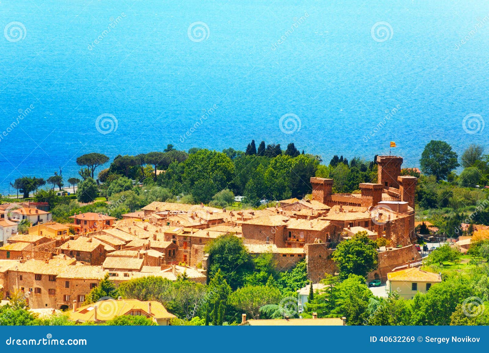 view on bolsena village and castle in italy