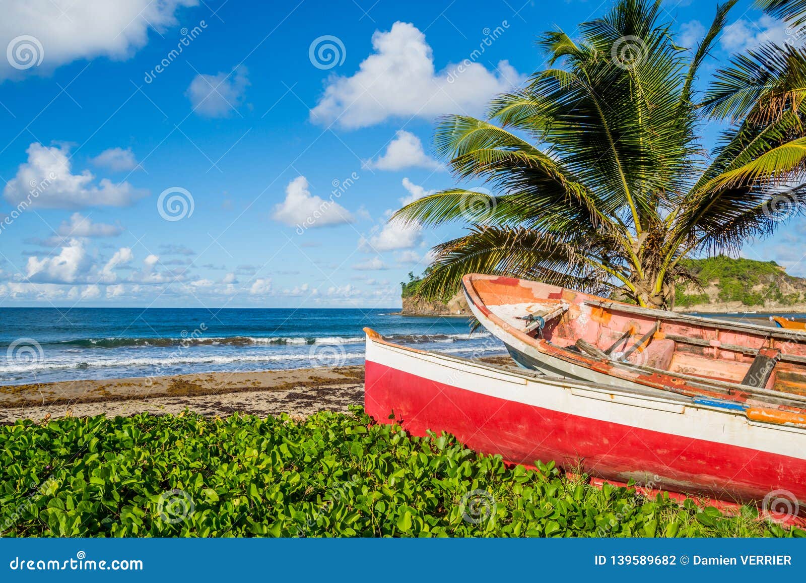 caribbean martinique beach beside traditional fishing boats