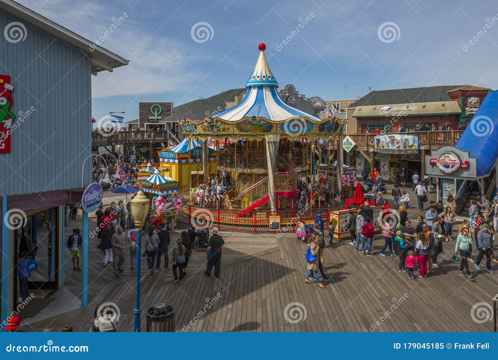 Tourists on Fisherman`s Wharf, Pier 39 at Carousel Editorial Stock