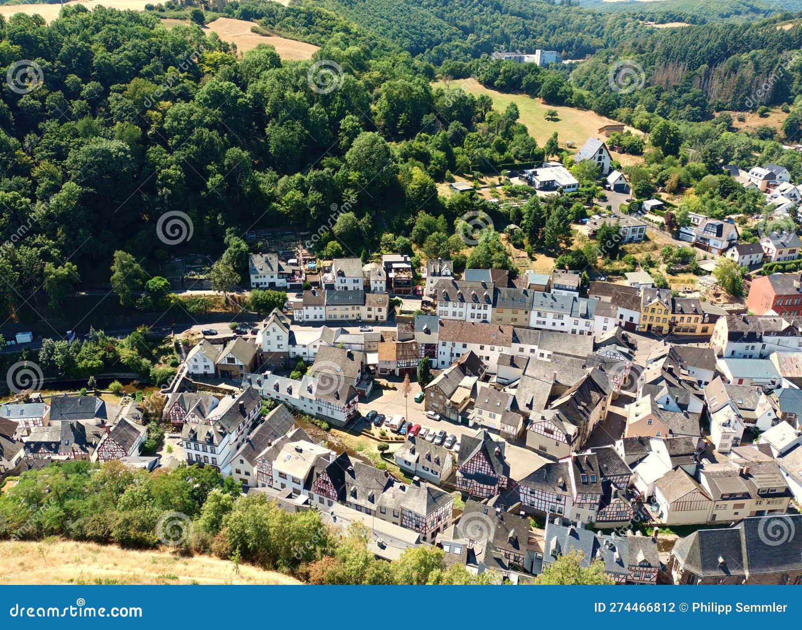 view from castle ruin lÃ¶wenburg on village monreal in gernan region eifel