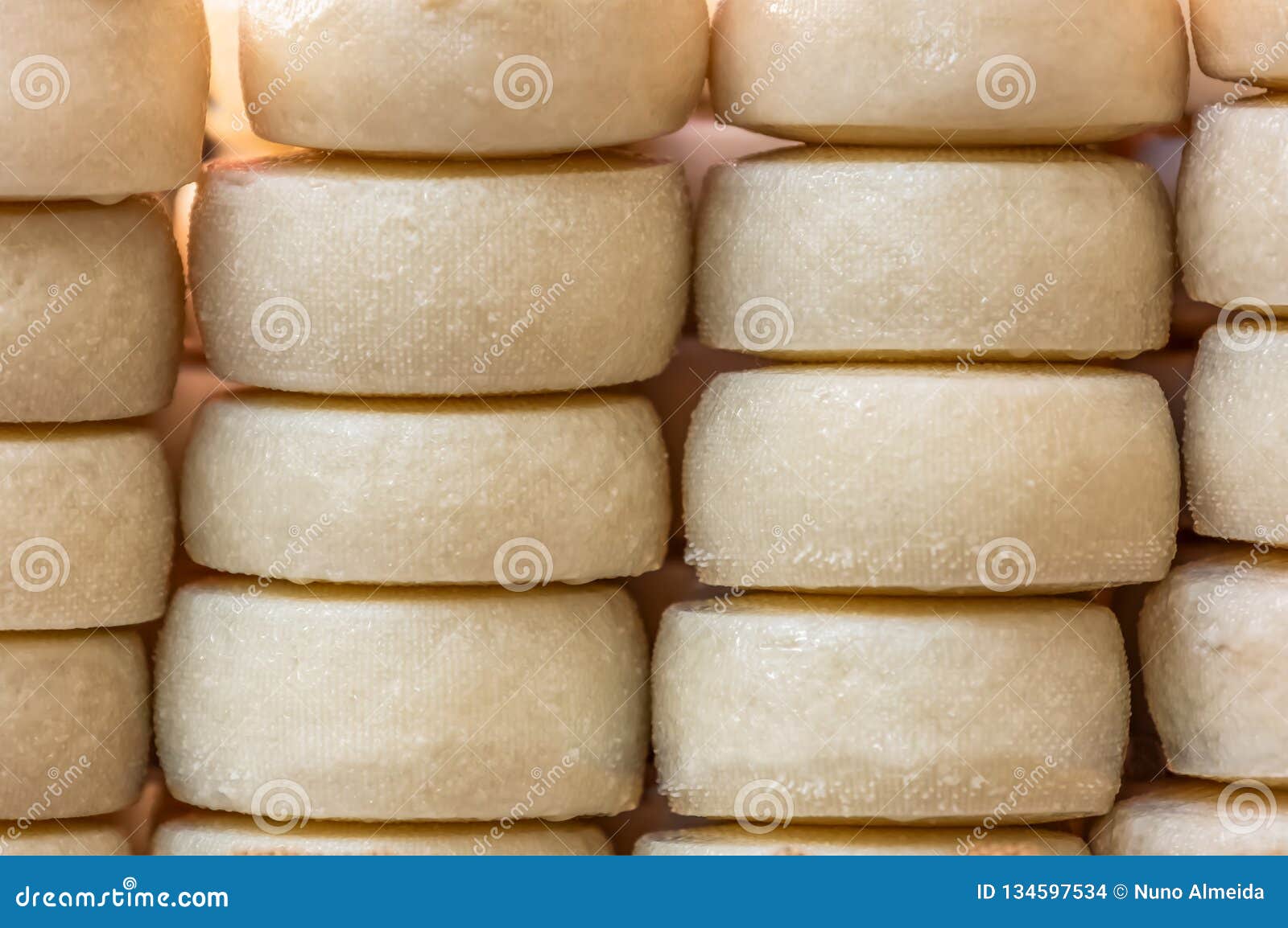 View of Cheeses Stacked in Traditional