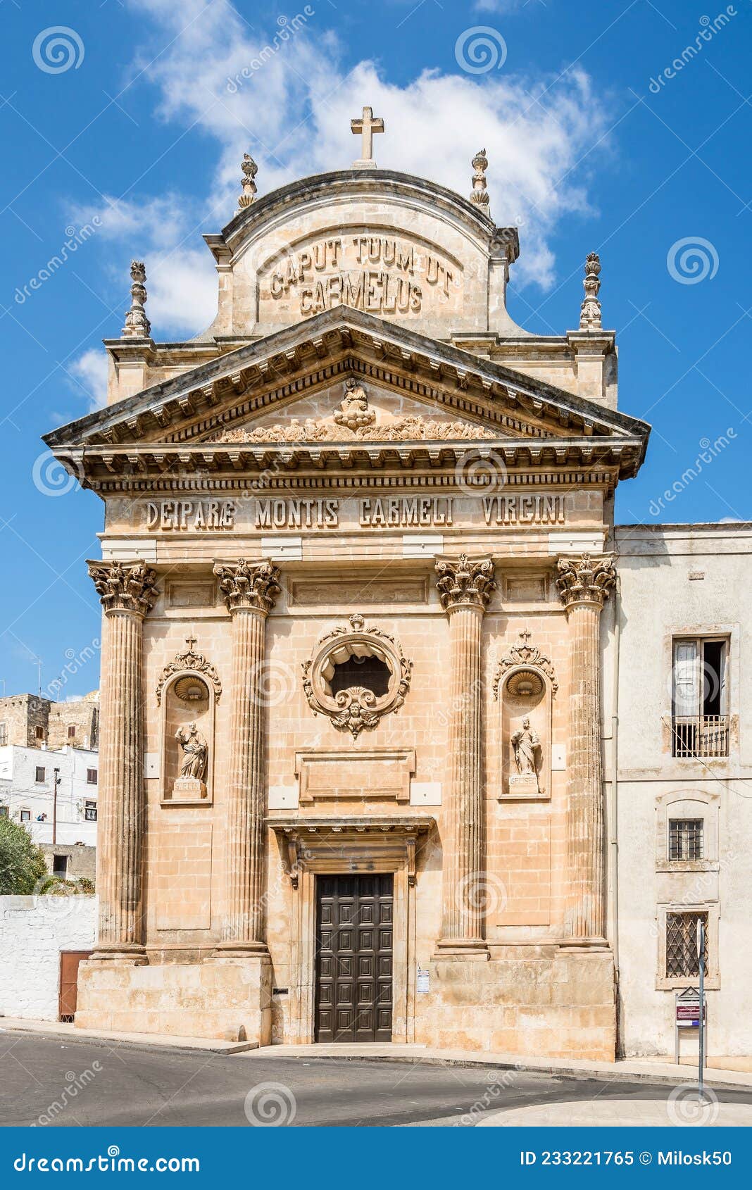 view at the church of carmelitas in the streets of ostuni - italy