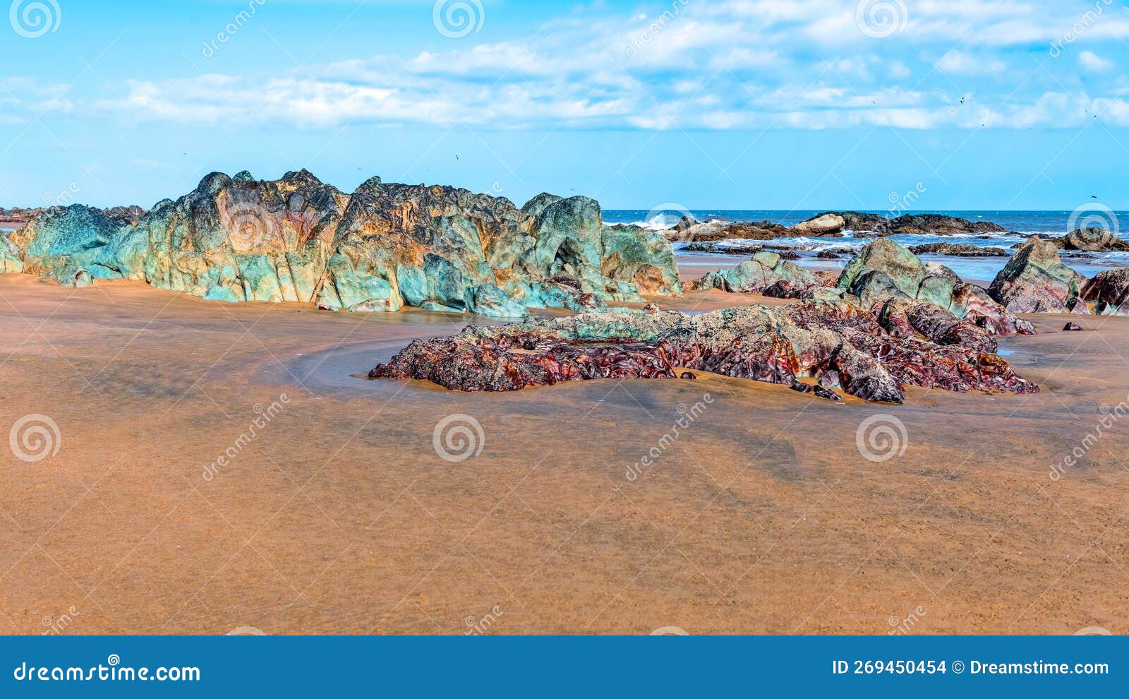colorful rock formations at playa lagarto, located near pedasi in panama
