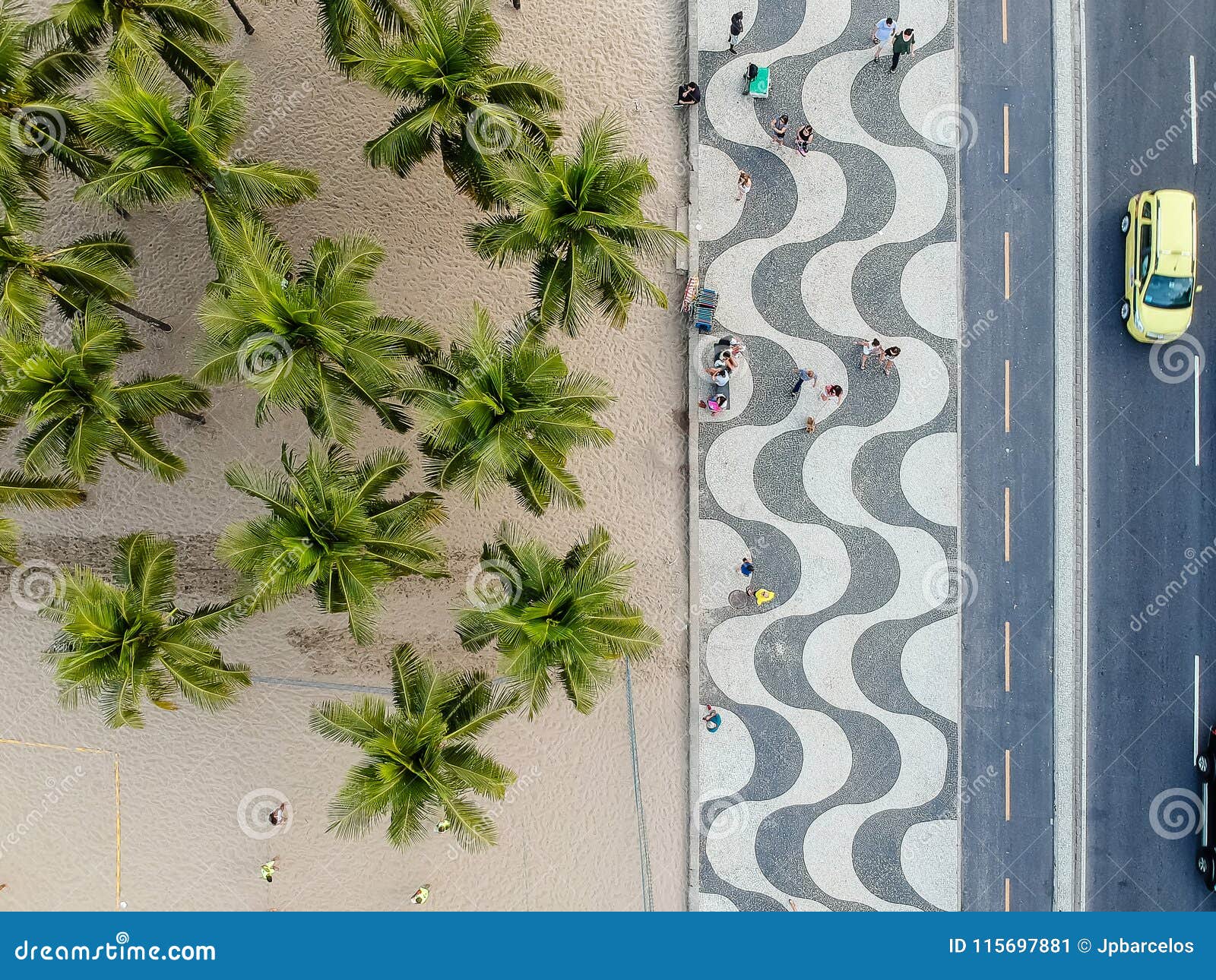 view of copacabana boardwalk during late afternoon, taken with a drone, with the famous portuguese stone texture . rio de janeiro,