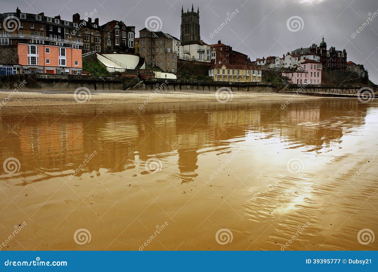 view of cromer beach and town