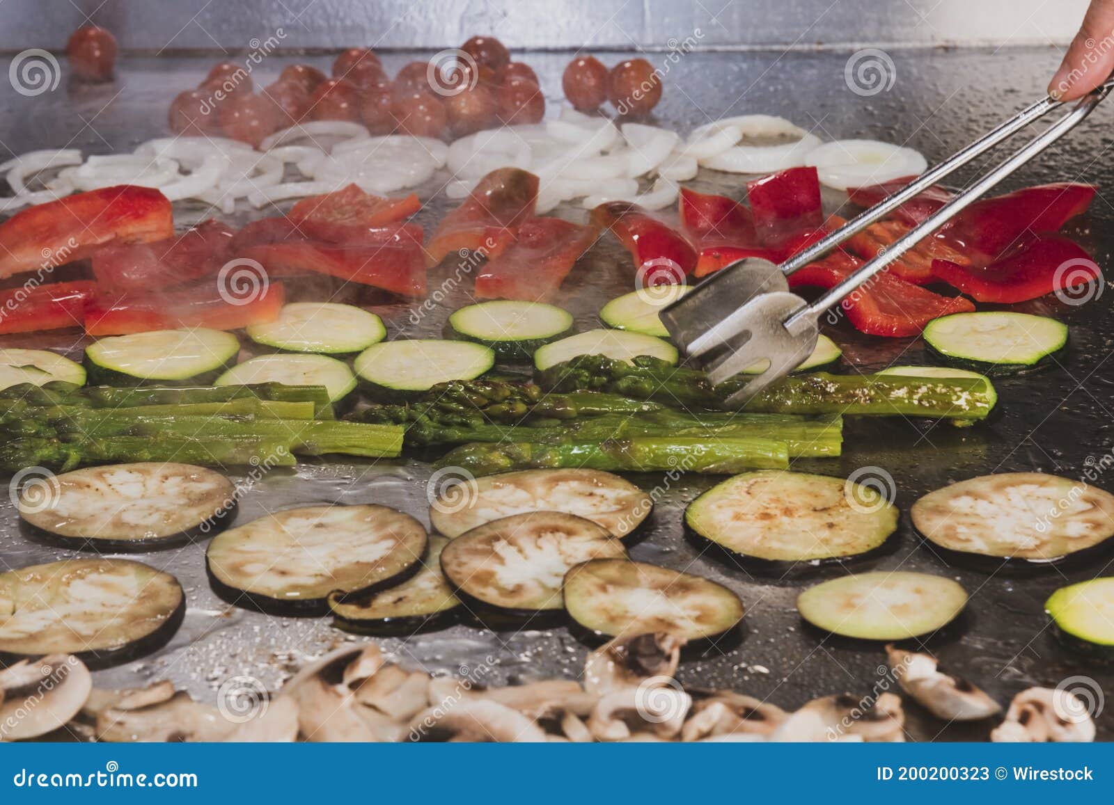 View of Different Vegetables Roasting on a Spanish Grill Stock Image