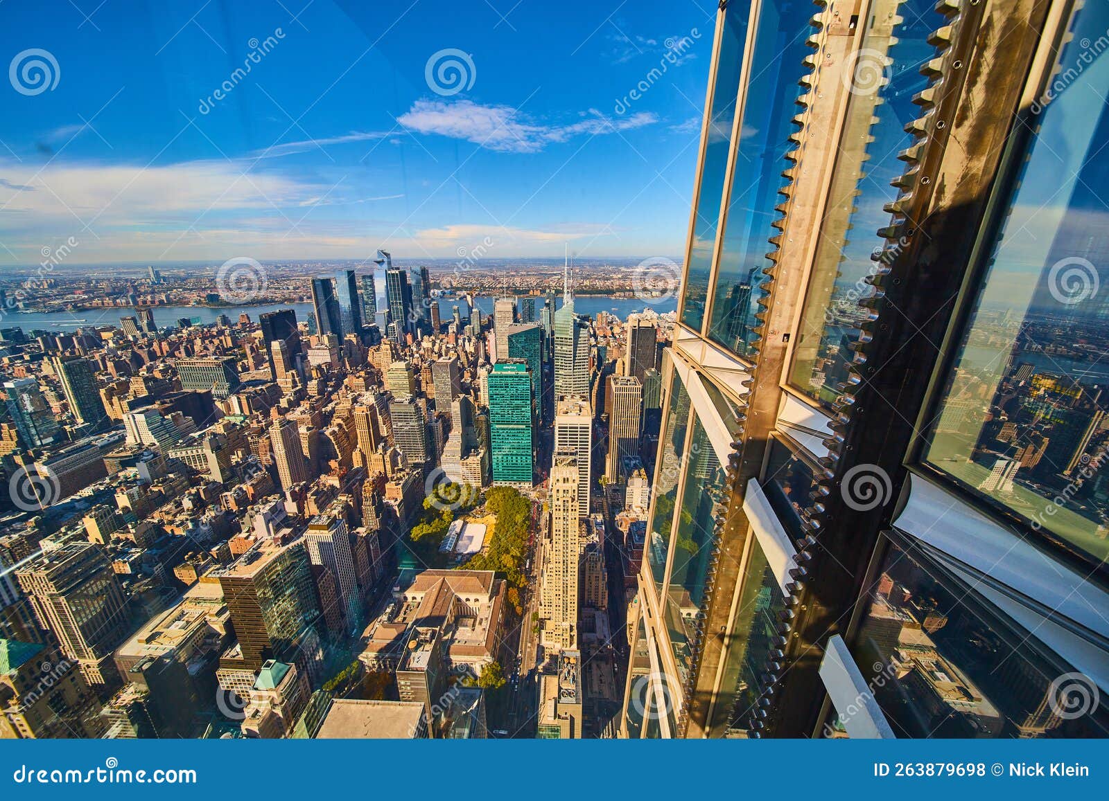 View on Edge Outside Skyscraper with Gears for Elevator Overlooking New