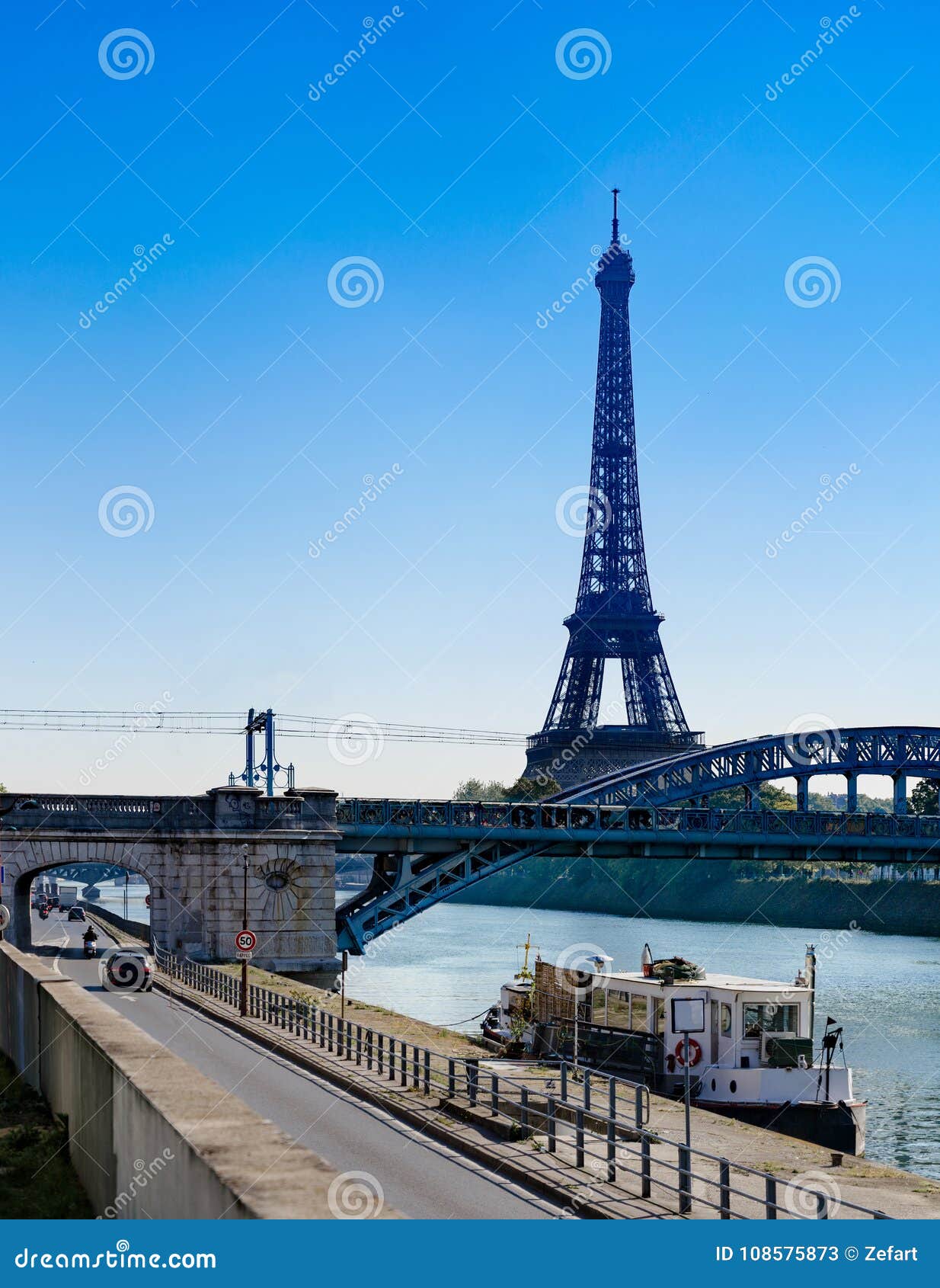 view at eiffel tower and railway bridge rouelle crossing swan island
