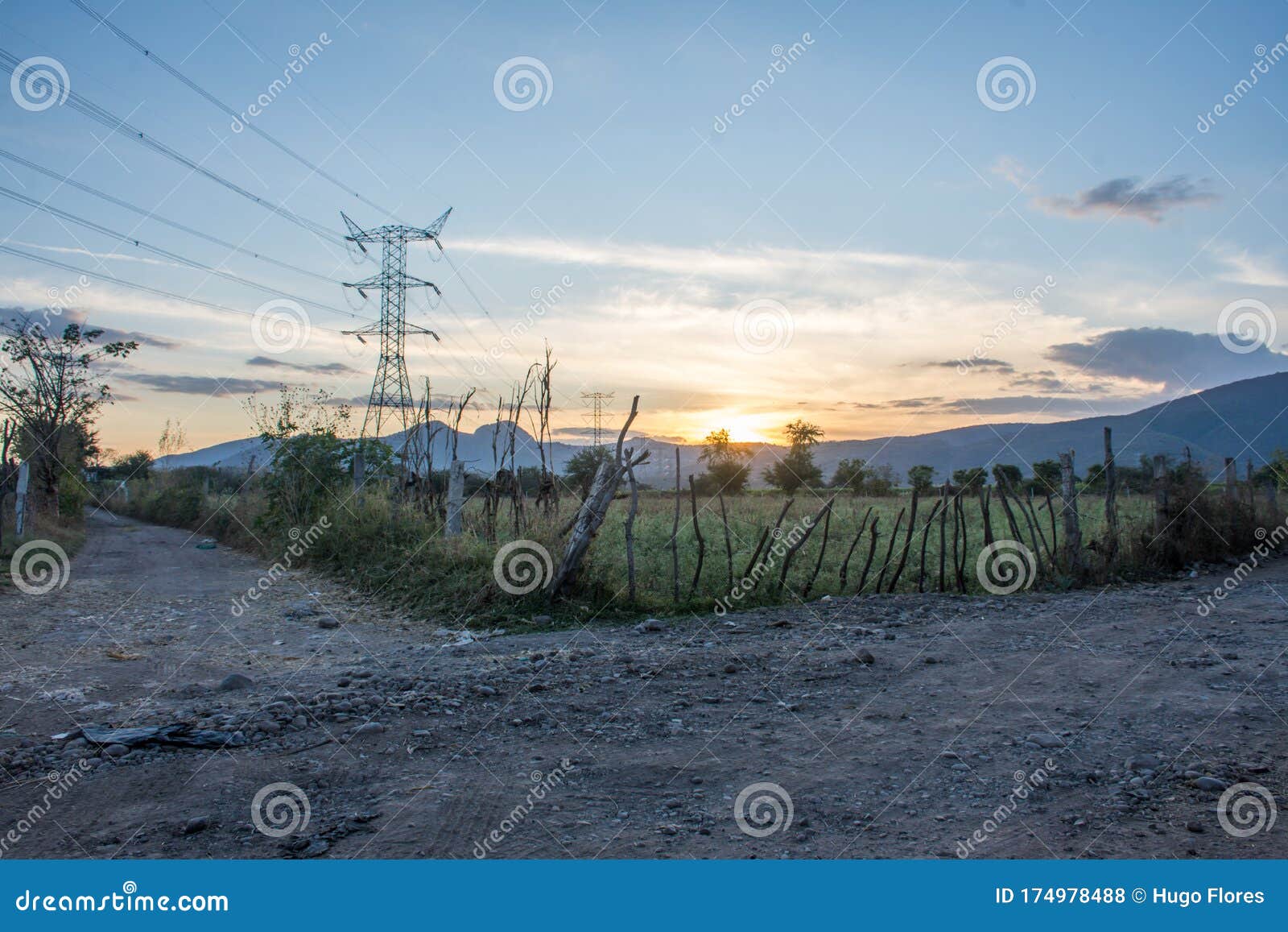 view of electric tower at sunset