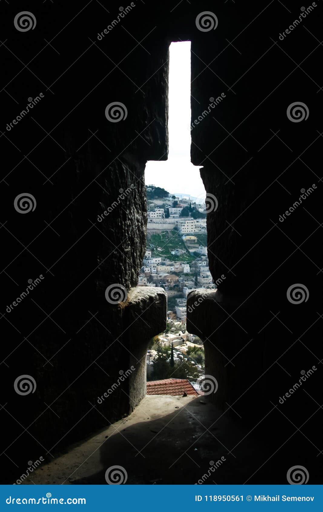 the view through the embrasure in the fortress wall of jerusalem