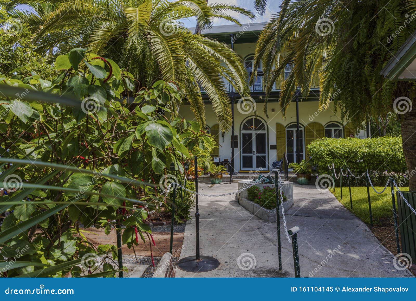view on the ernest hemingway home and museum. beautiful green trees at the entrance checkpoint. usa. key west.