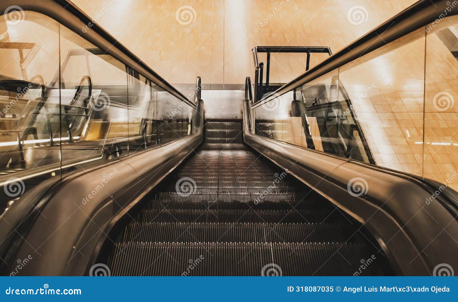 escalators at the chamartin metro station in madrid, spain.