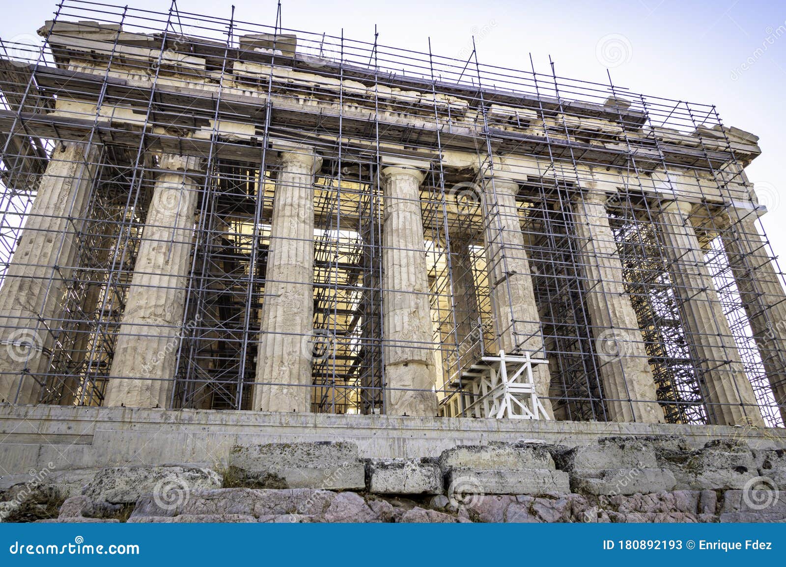 view of the facade of the partenon in athens surrounded by scaffolding, greece