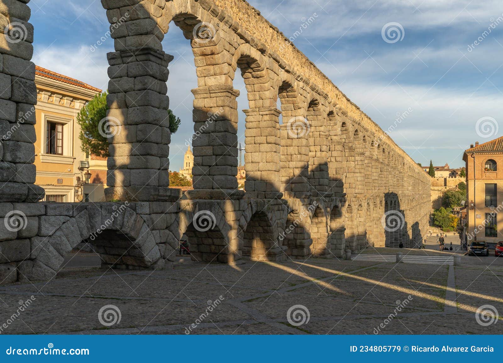 view of the famous aqueduct of segovia in spain