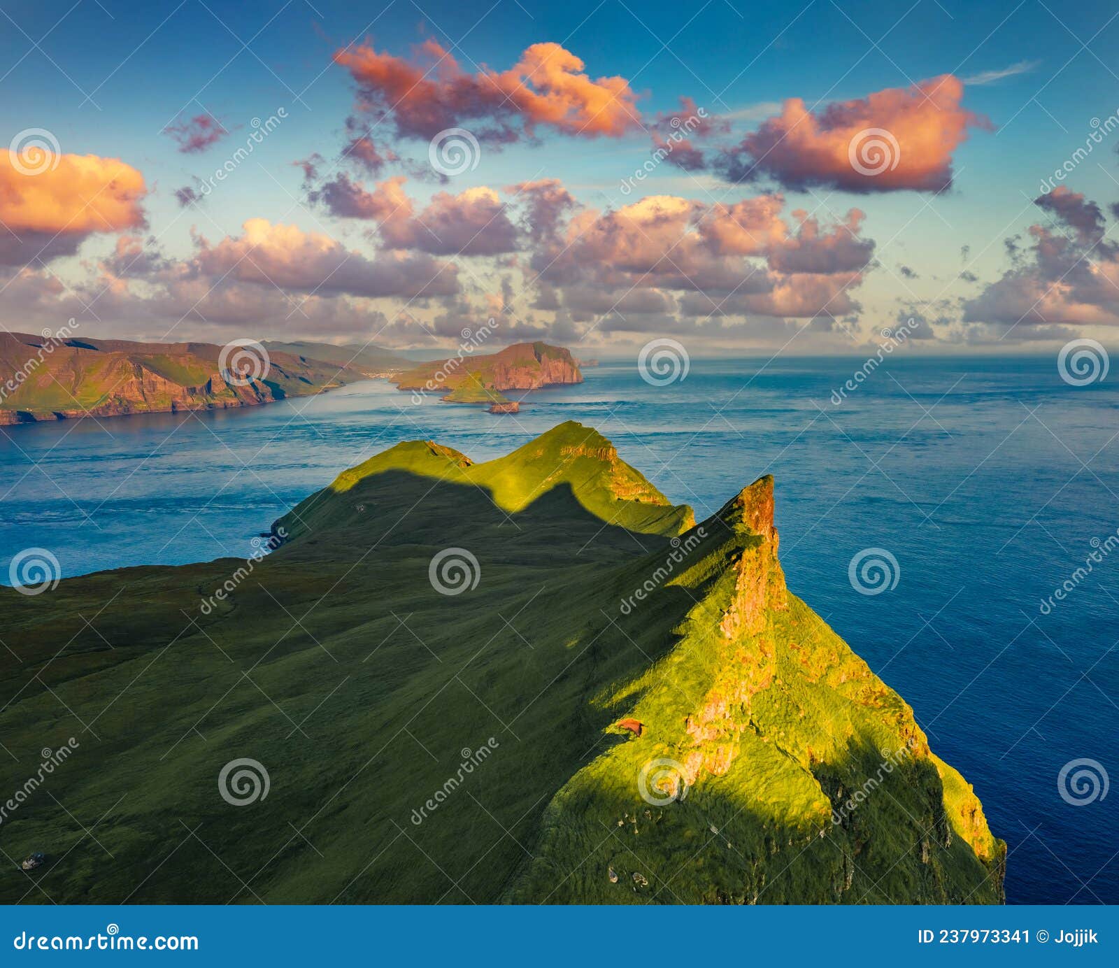view from flying drone. great evening scene of mykines island. fantastic summer view of alaberg cliffs, faroe islands, denmark, eu