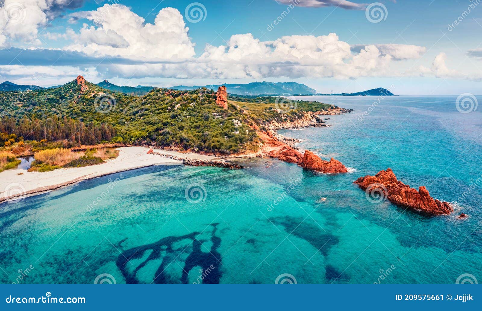 view from flying drone. wonderful summer view of di cea beach with red rocks gli scogli rossi - faraglioni. aerial morning scene o