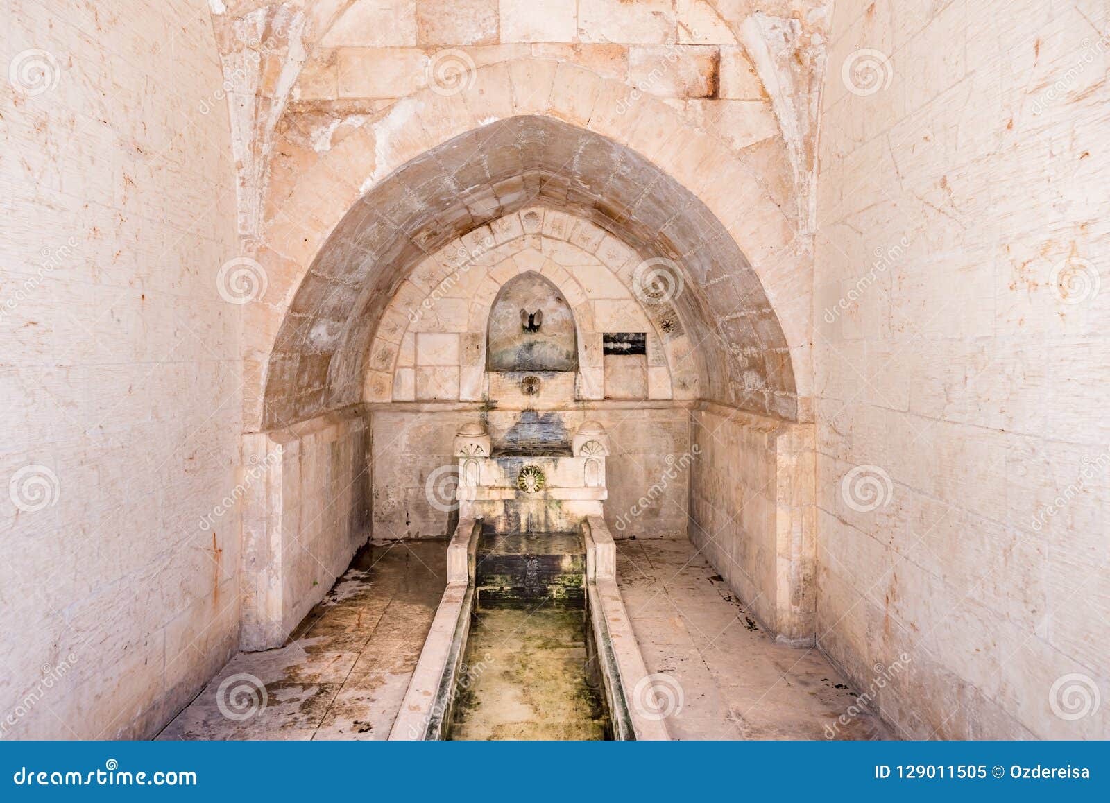view of fountain for ablution in courtyard of abdullatif mosque
