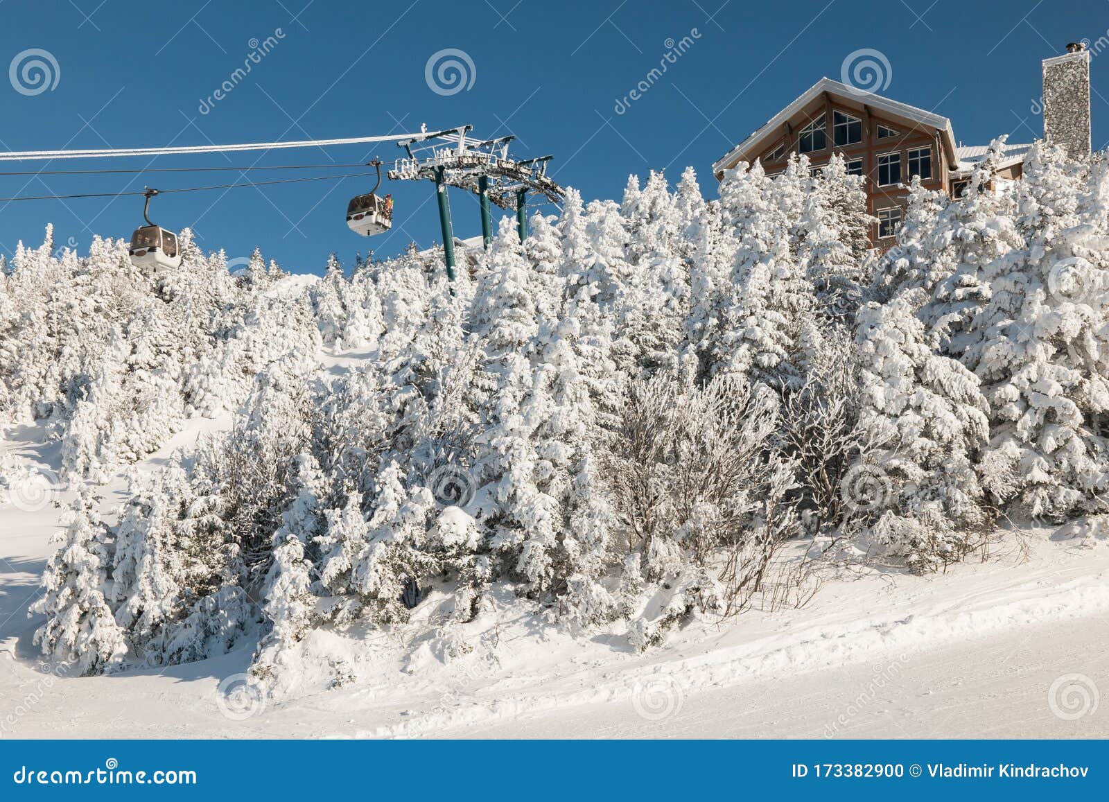 View Of Gondola Lift With Snow Covered Mountains Gondola Above Ski Slope Stock Photo Image Of