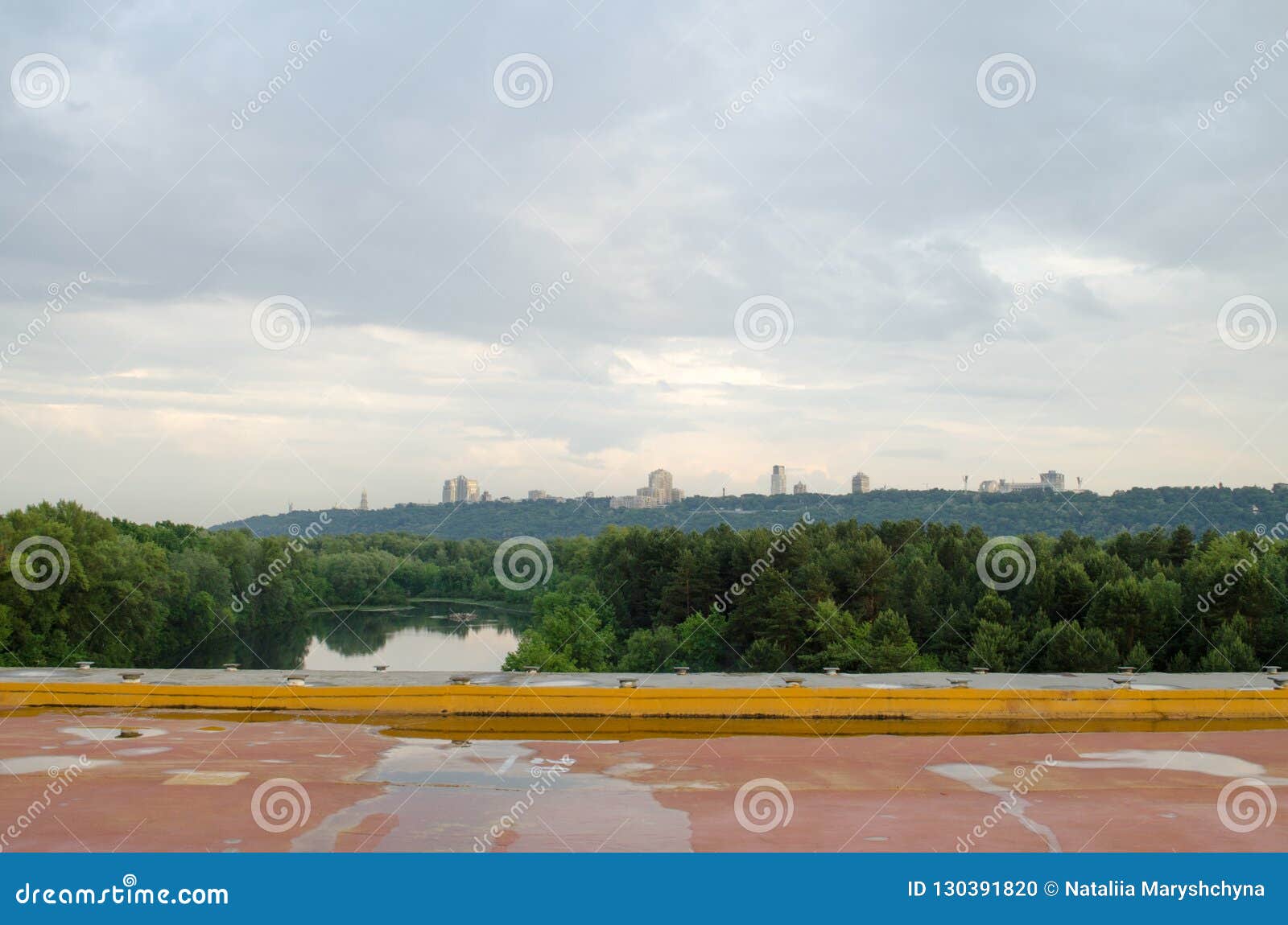 View of Green Hills with Buildings. Green City. Stock Photo Image of