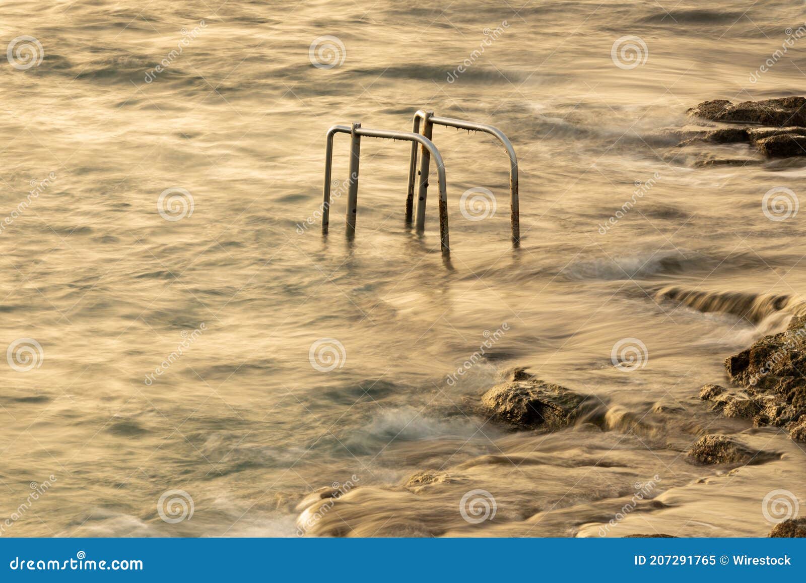 view of handrailings in the bay during high tide