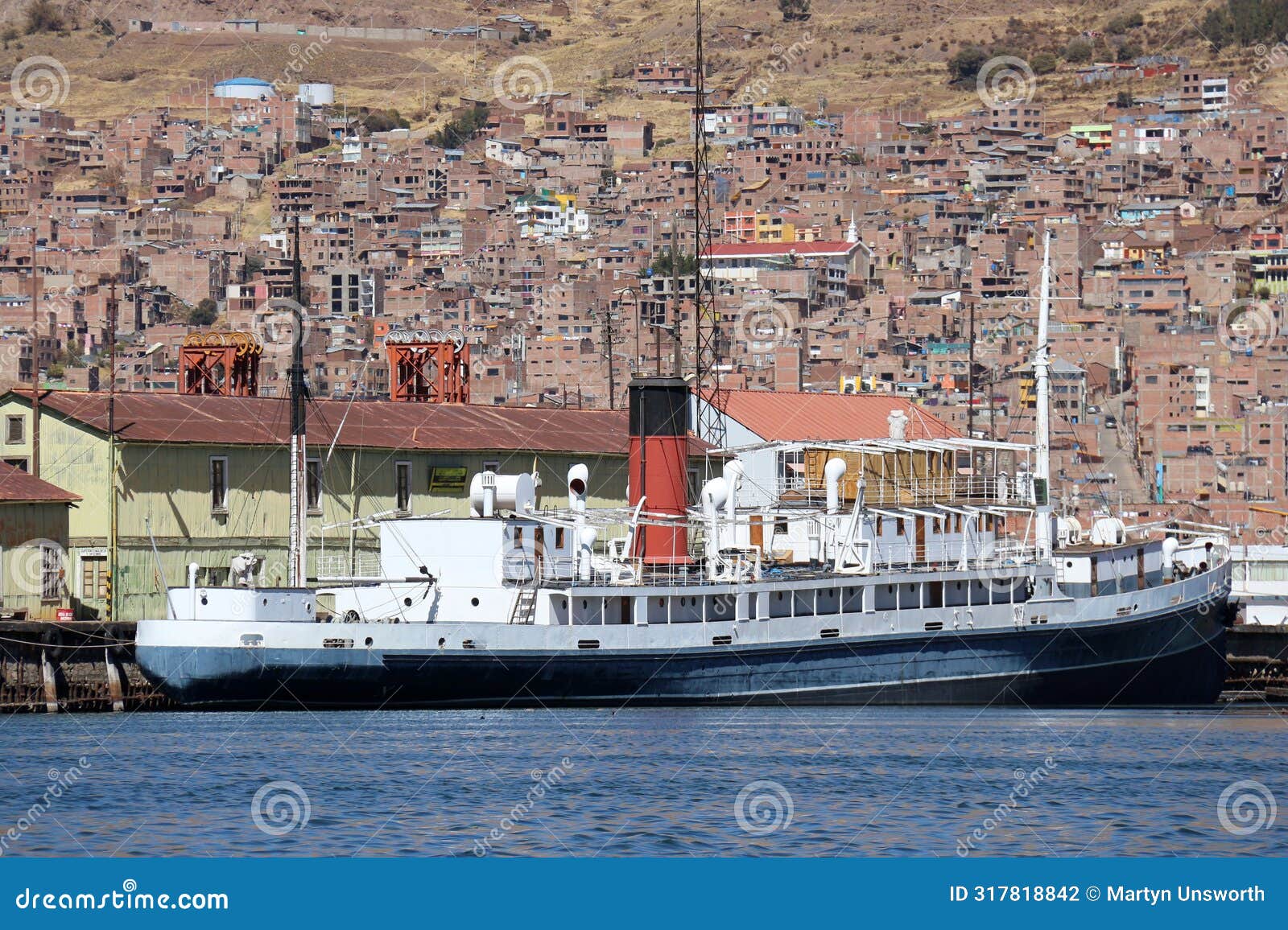 historic steamship docked on lake titicaca in puno, peru