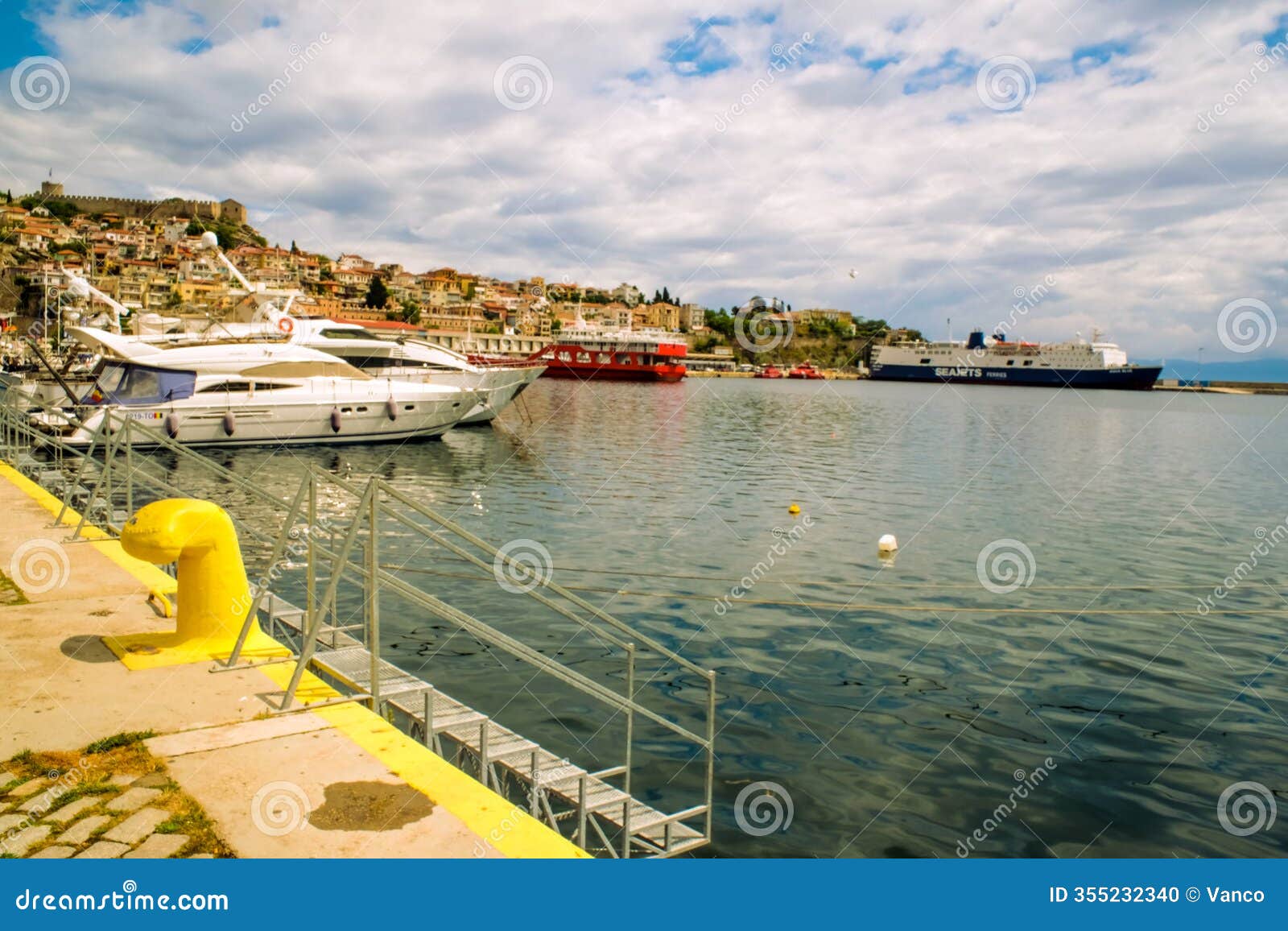 fishing boats in the harbor of kavala city in greece. dock for boats and yachts