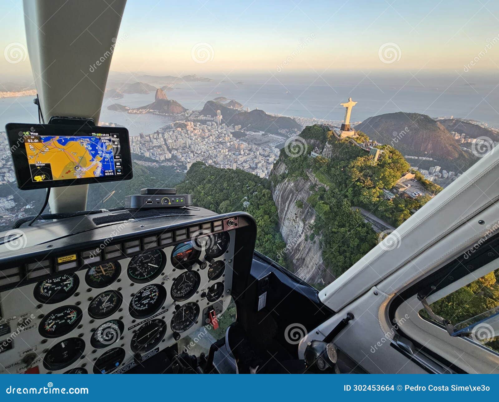 view from a helicopter cockpit to rio de janeiro skyline - brazil