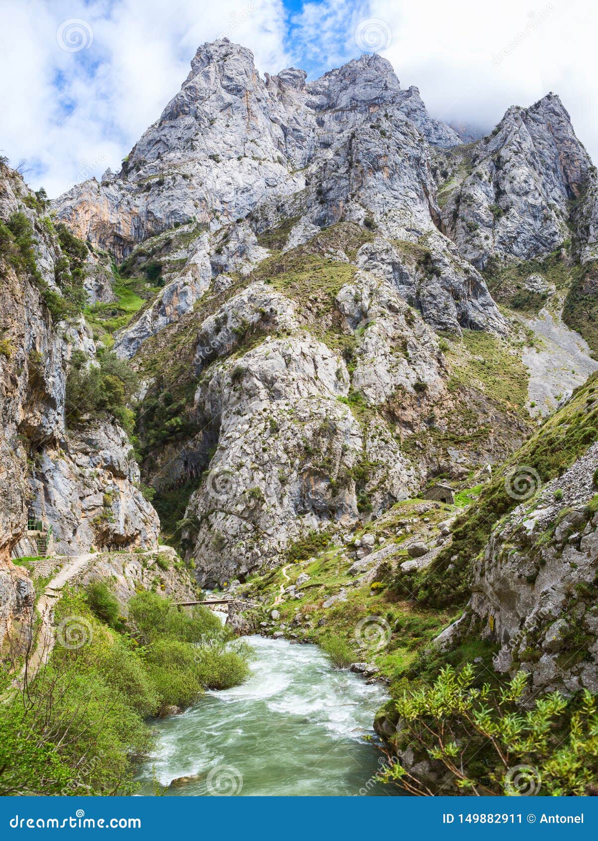 view from hiking trail cares trail or ruta del cares along river cares in spring near cain, picos de europa national park,