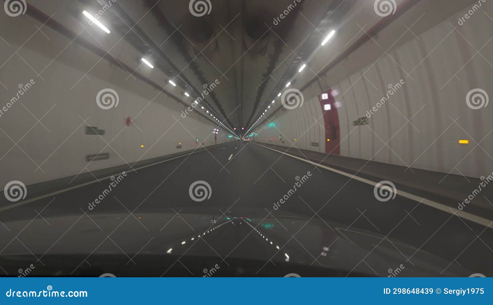 View from Inside the Car of an Illuminated Tunnel in the Light of