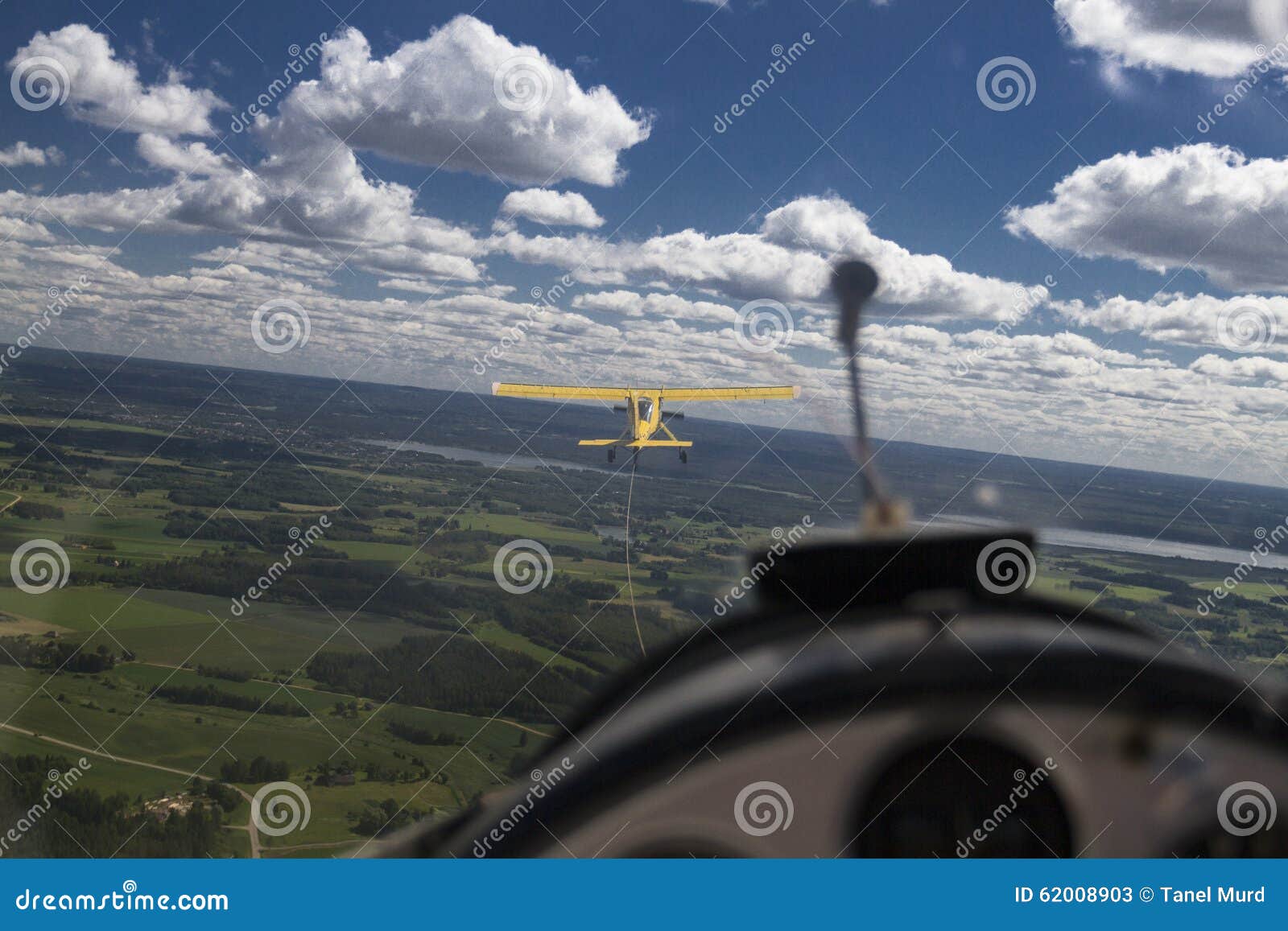 The View from Inside a Glider As it is Being Towed by Another Plane