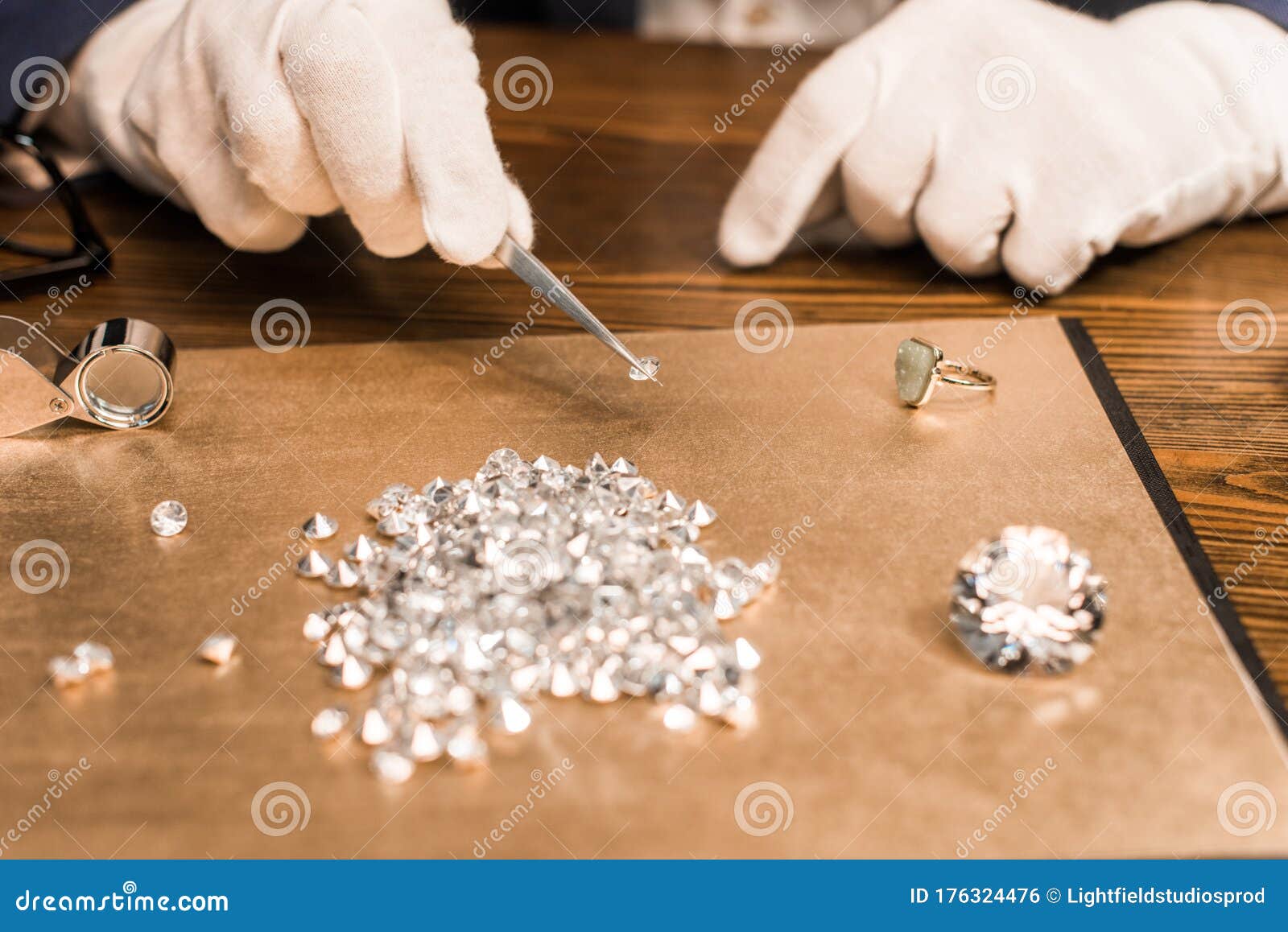 View Of Jewelry Appraiser Holding Gemstone Stock Photo ...