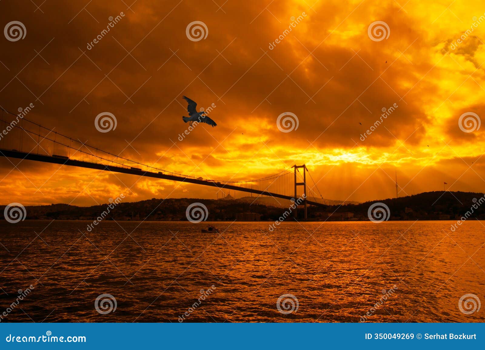 view of the july 15 martyrs bridge (bosphorus bridge) and camlica mosque at sunrise
