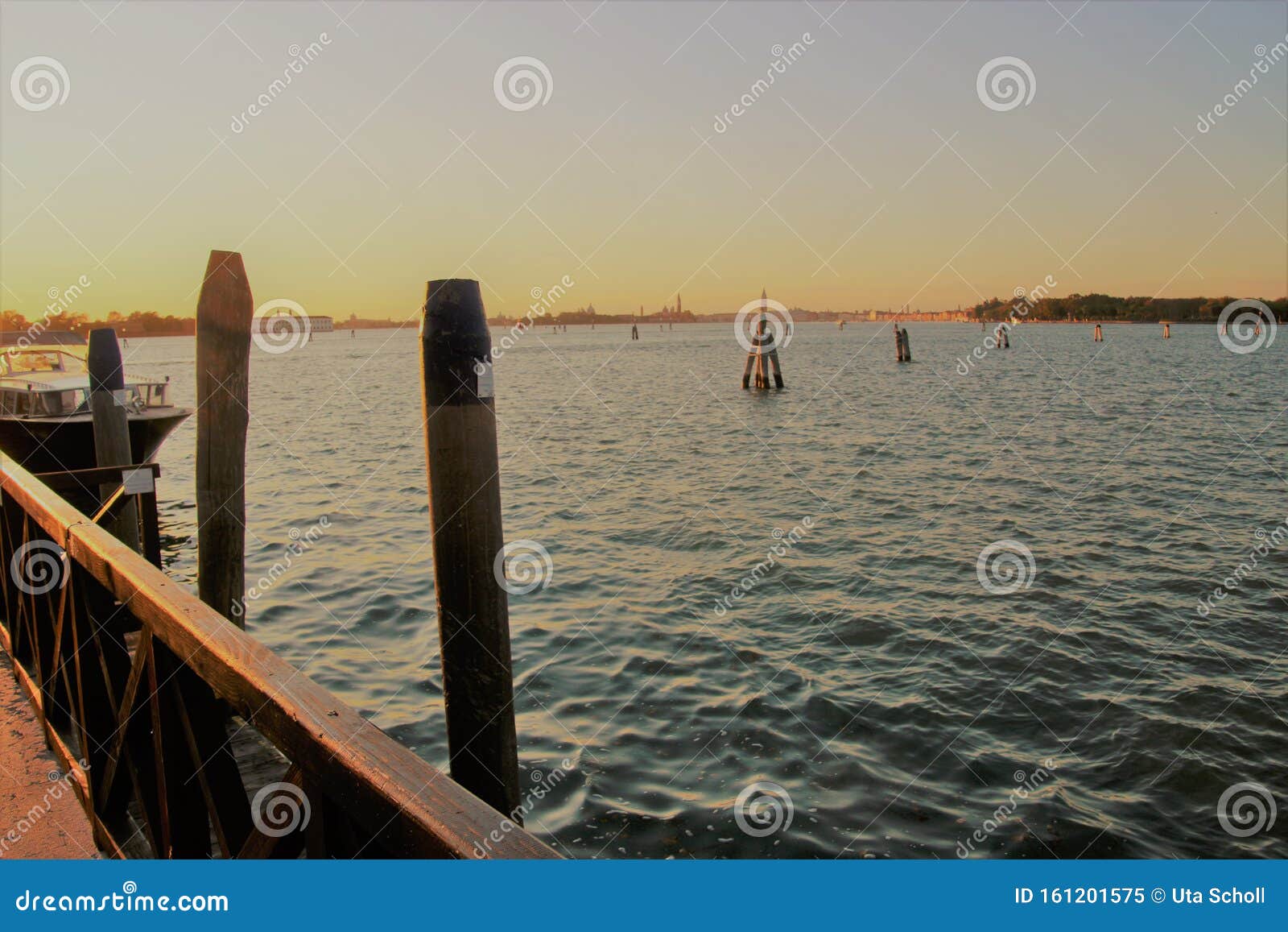 the lagoon of venice at sunset, seen from the island lido di venezia. italy.