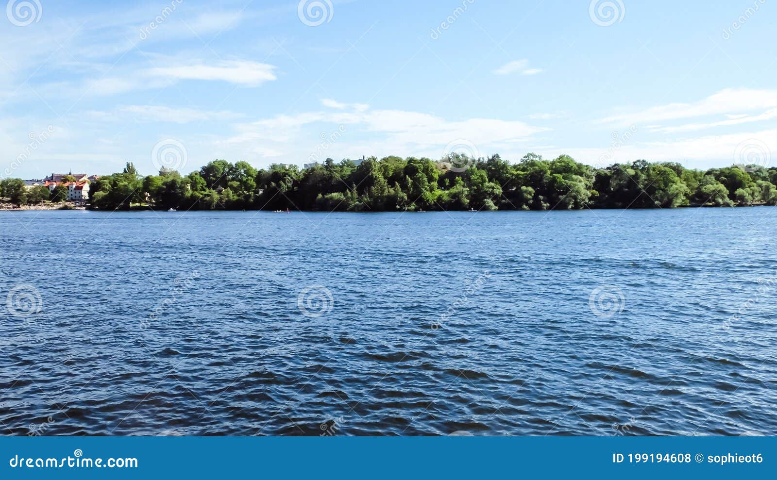 view of lake malÃÂ¤ren in stockholm with people swimming and paddling