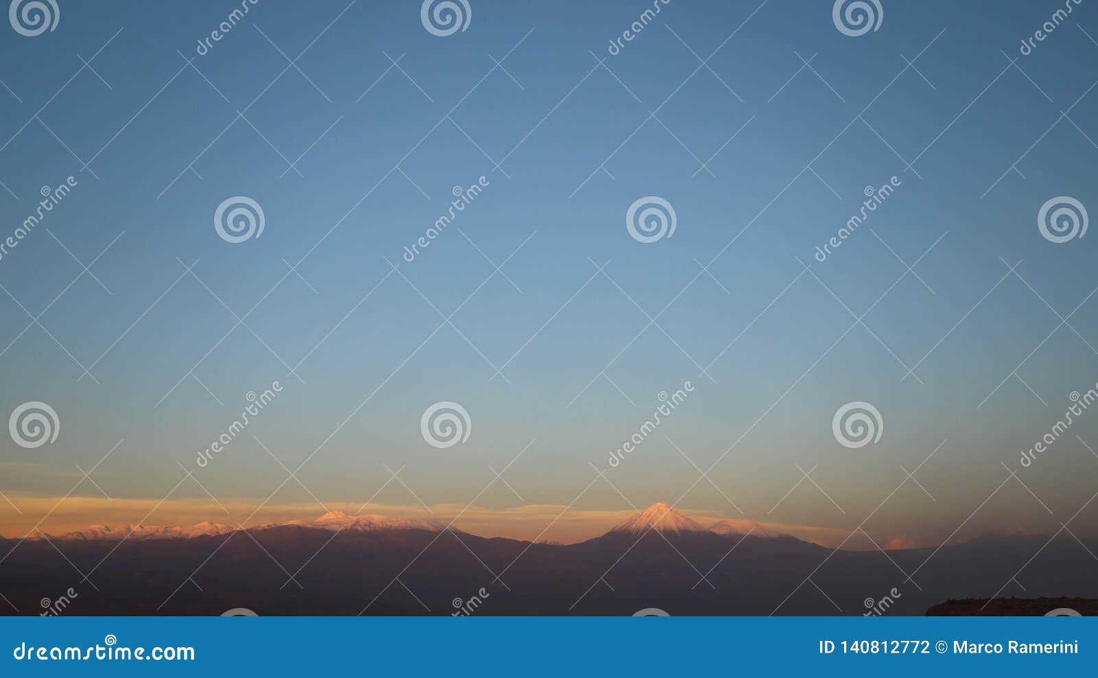 valle de marte - mars valley and the licancabur volcano at sunset, atacama desert, chile