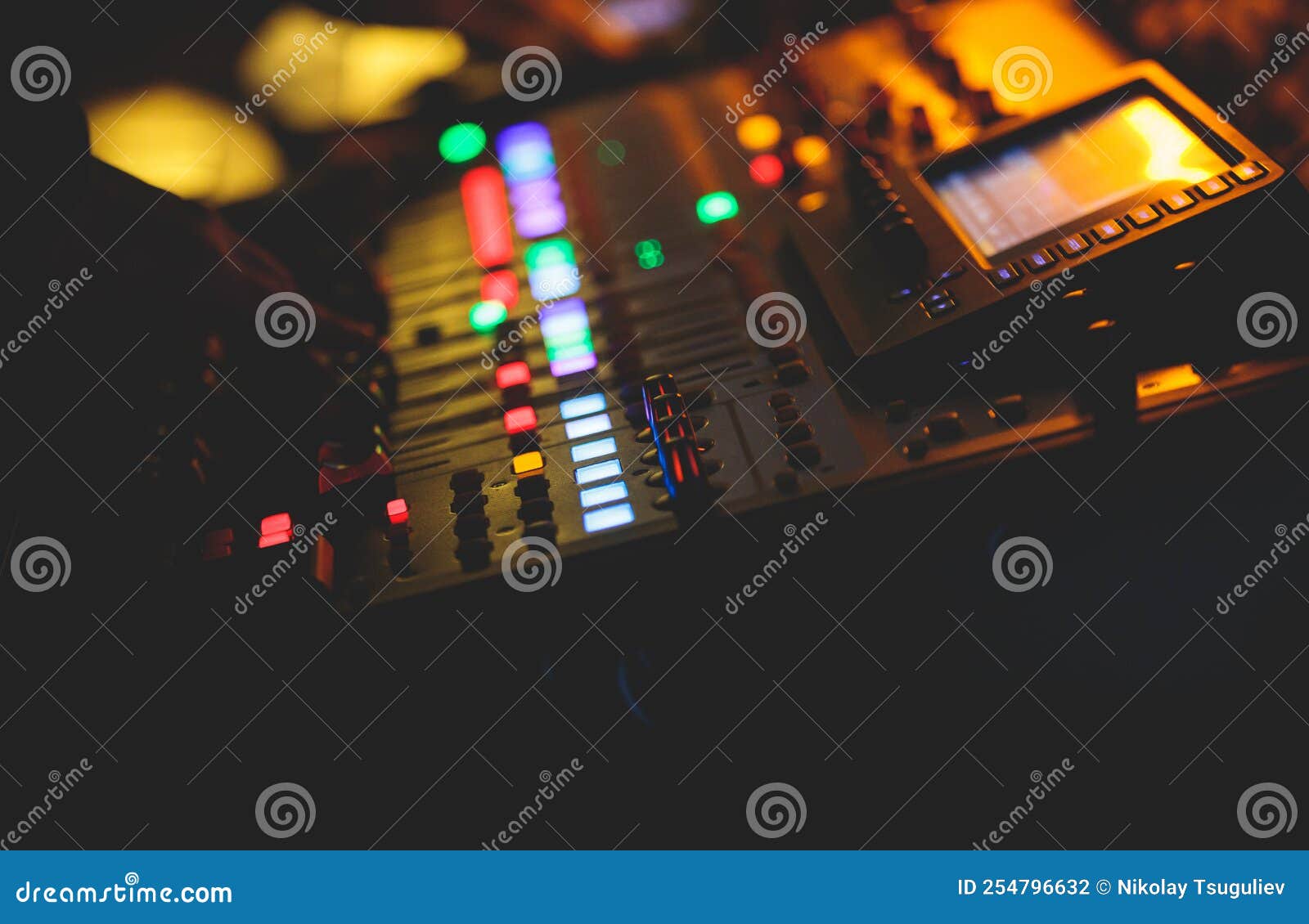 View of Lighting Technician Operator Working on Mixing Console