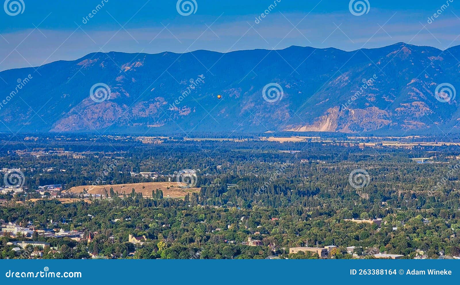 view from lone pine state park with a hot air balloon over kalispell mt