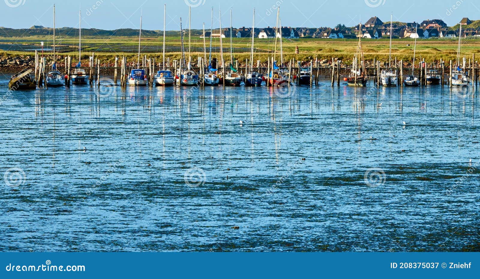 view during low tide to the port of rantum in the wadden sea of the island sylt, germany