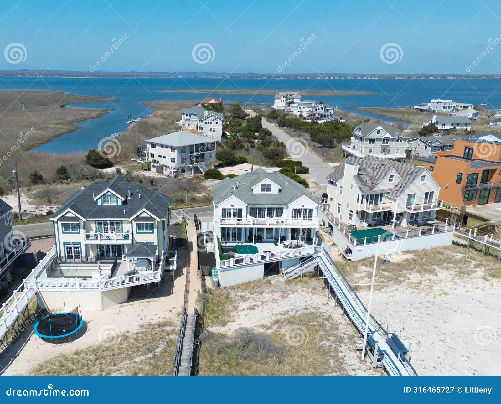 view of luxury homes along the beach in the hamptons long island new york
