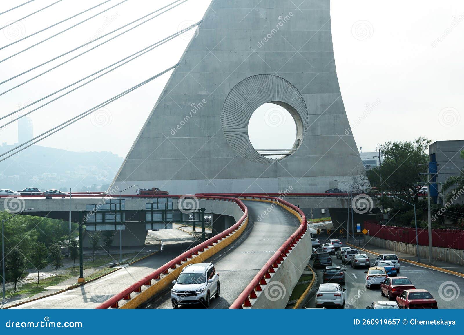 view of many cars on modern bridge