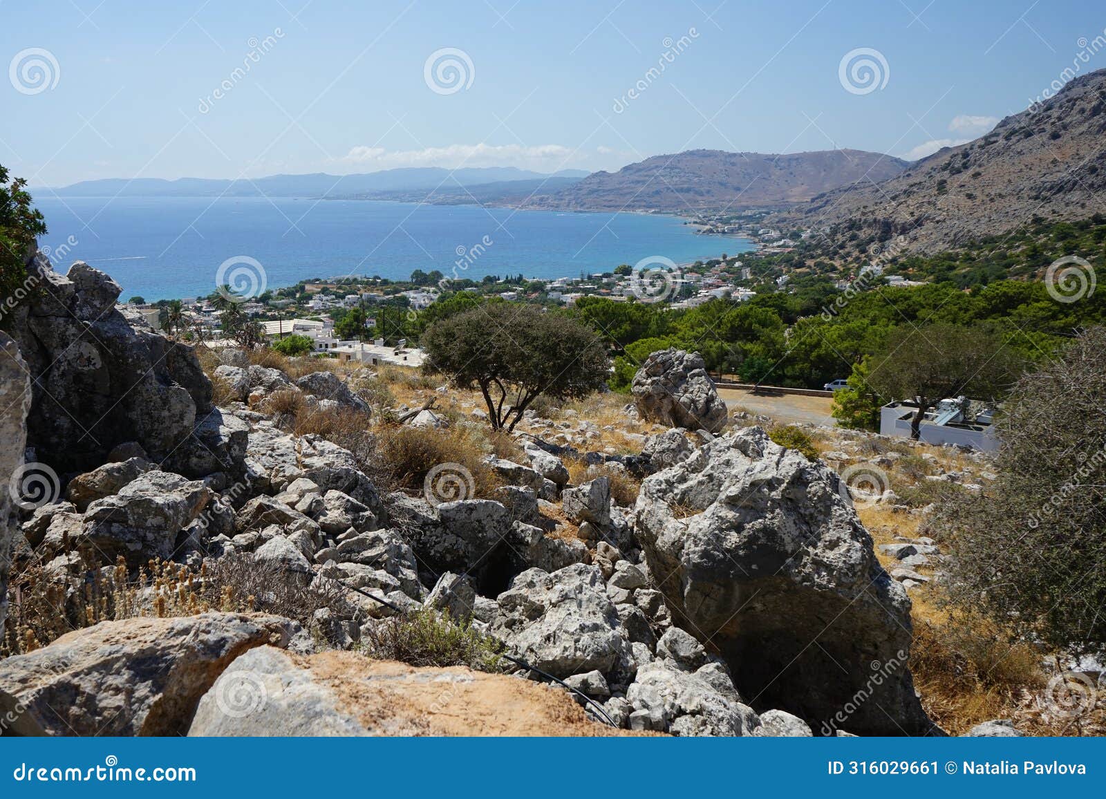 view of the mediterranean coast in the vicinity of pefki in august. pefkos or pefki, rhodes island, greece