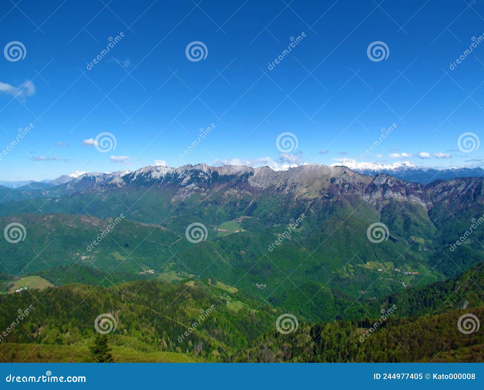 view of a mountain range in julian alps in gorenjska, slovenia above baska grapa
